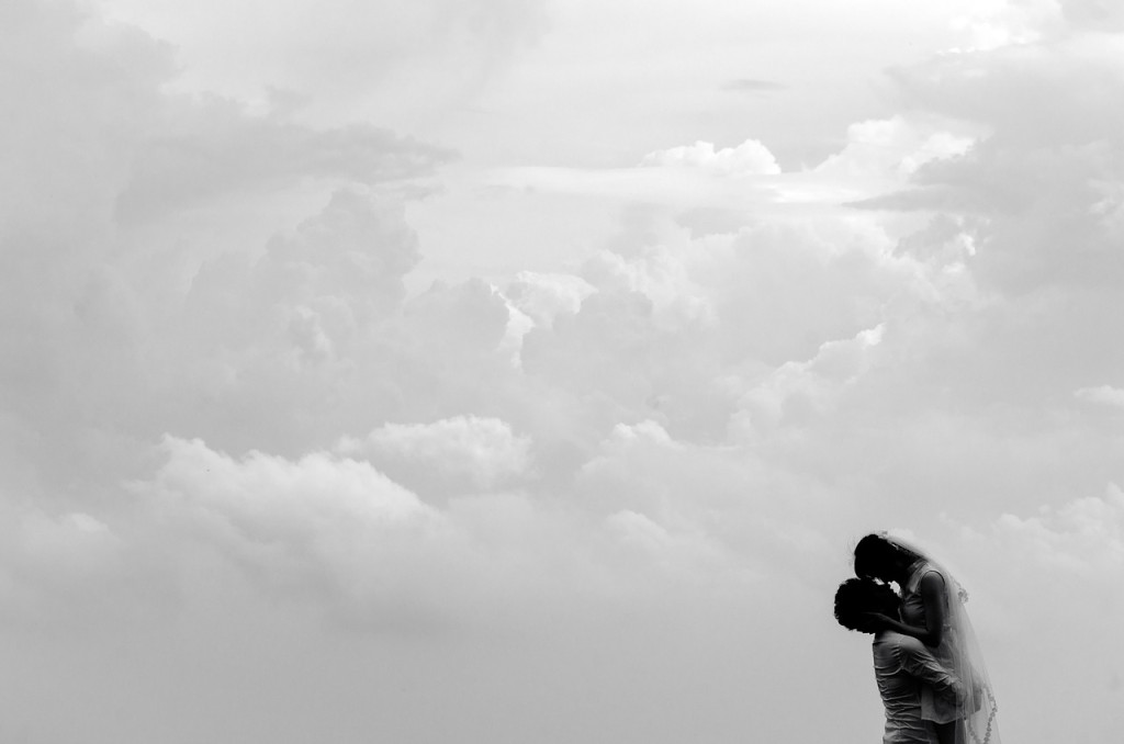 couple silhouette greet spouse